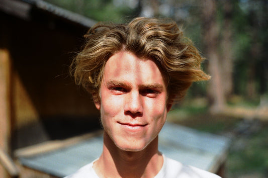 man in white collared shirt