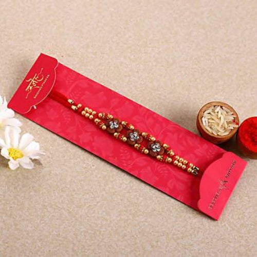Ethnic American Diamond Rakhi and Kaju Katli Box Combo