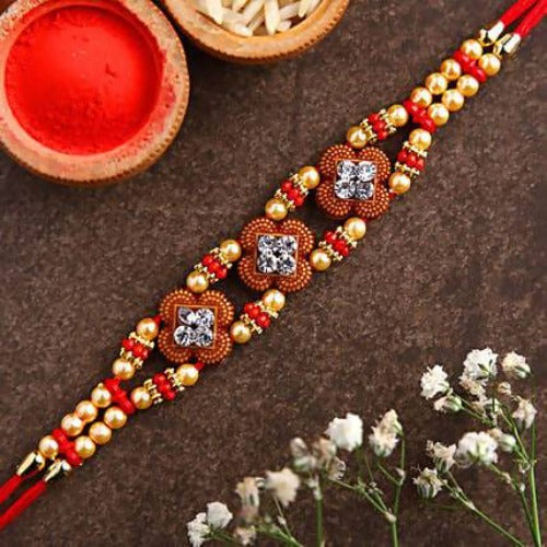 Ethnic American Diamond Rakhi and Cashew Jar Combo