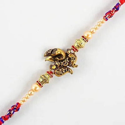 Ganesha Rakhi & Cadbury Silk In Mera Bhai Sleeve