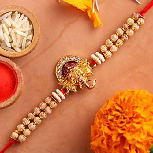 Beautiful Ganesha Rakhi and Silk Chocolates