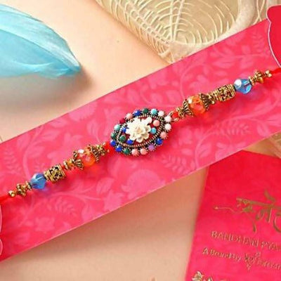 Floral Blue Beads Rakhi & Coffee Biscotti Hamper Combo