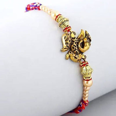 Ganesha Rakhi & Cadbury Silk In Mera Bhai Sleeve